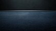 © angelmaxmixam - Poker and casino gambling table close-up side view with dark blue felt cloth. Copy space.