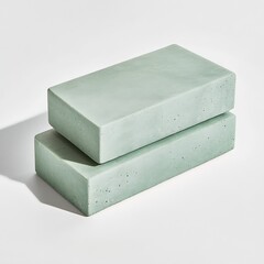 Poster - Two aesthetically pleasing rectangular concrete blocks with a smooth textured surface arranged neatly on white backdrop : Generative AI