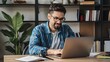 © cute - businessman working on laptop