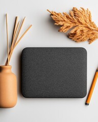 Fototapete - Minimalist Digital Zen Sleek Gray Laptop on Neutral Backdrop with Terracotta Accents - Modern Workspace Wellness and Productivity Design
