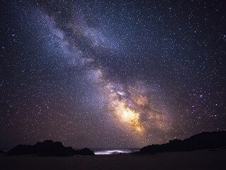 Wall Mural - majestic milky way galaxy shines above the dark beach coastline in a breathtaking nightscape astrono