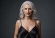 © zuperabah - Elegant Woman with Gray Hair Posing in Black Silk Lingerie Top