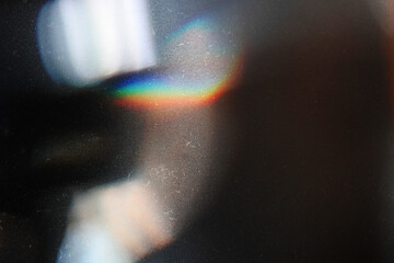 Wall Mural - designed film texture background with heavy grain, dust and a light leak real lens flare shot in stu
