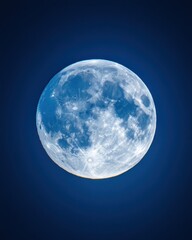 Wall Mural - ethereal full moon shining brightly against a deep blue sky creating a celestial and serene atmosphe