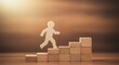 © PP Creative - A small wooden silhouette of a person ascending a staircase made of wooden blocks symbolizing progress and growth