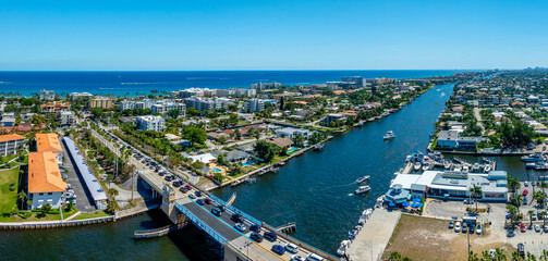 Wall Mural - Drone view of Deerfield Beach, Florida with city and bridge 