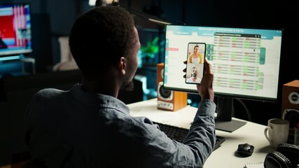 Wall Mural - black economist on video conference chat with consultants analyze earnings balance and tracking fina