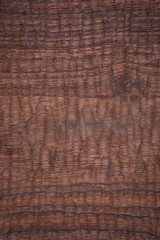 Wall Mural - texture of the old wood. walnut wood plank texture background.hand carved knife pattern wood board b