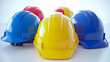 © Pumapala - Colorful hard hats safety teamwork