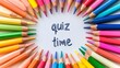 © Liliia - A vibrant array of colored pencils encircles the cheerful phrase inviting participants to dive into an entertaining quiz time, sparking imagination and learning in any space