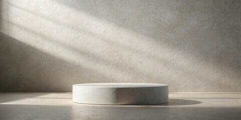 Poster - A Minimalist White Platform in a Room with a Rough Textured Wall and Sunbeams Casting Long Shadows