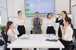 © SOMKID - Happy excited business teamwork with marketing strategy analysis in meeting room at office, Business people working together in creative office, Business group celebrating in boardroom meeting.