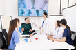 © SOMKID - Team of doctor with human model and orthopedic surgeon, Healthcare and medical concept.