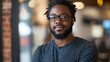 © indirah - Confident man office portrait, blurred background
