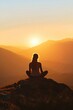 © ARTIFICIAN - Serene figure meditating on mountain top at sunrise, symbolizing inner peace and clarity