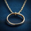 © Guli Studio - a gold necklace with a gold ring