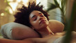 © Health Studio - A serene woman relaxes with closed eyes, surrounded by soft light and greenery, embodying tranquility and self-care.