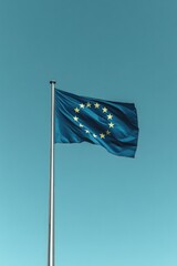 Wall Mural - celebrate europe day with colorful image of european flag waving in wind against clear blue sky leav