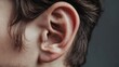 © Giovanni - Human auricle, male, external ear, anatomy and structure, hearing impairment and evaluation, selective focus.