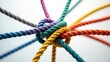 © Giovanni - Diversity team concept of unity and teamwork serves as a business metaphor for forming a partnership illustrated by connected ropes, symbolizing cooperation and worker collaboration.