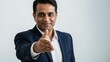 © Qbertstudio - South Asian man in business attire greeting with handshake in corporate environment, symbolizing partnership and teamwork