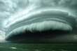 © Photo - Dramatic Low-Hanging Cloud Formation Over Dark Ocean Waves