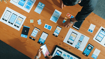 Wall Mural - top view of software developer working on ux ui design while team working together to brainstorm and