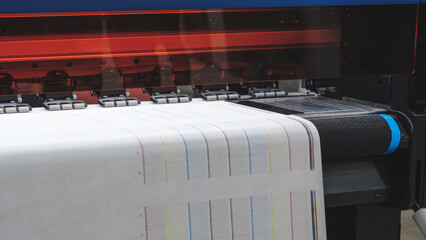 Poster - Industrial printer prints multicolor nozzle test check