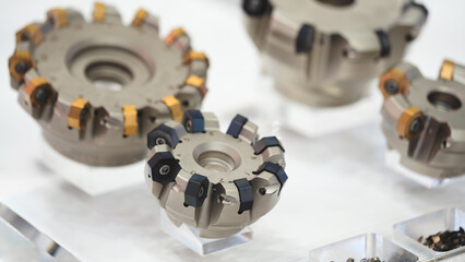 Aufkleber - industrial milling metal cutting tool with carbide cutter insert in workshop. Drills with interchangeable tungsten carbide heads