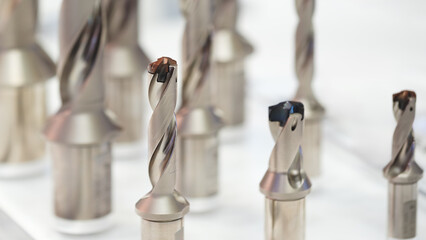 Aufkleber - industrial milling metal cutting tool with carbide cutter insert in workshop. Drills with interchangeable tungsten carbide heads