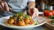 © Natalia - Chef plating a dish with roasted potatoes, herbs, and vegetables in a cozy kitchen setting, culinary artistry in action, copy space