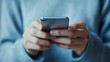 © rajagambar99 - Using a Mobile Phone in Hand for Communication and Information Access