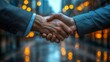© Andre - handshake between two businessmen