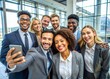 © Aminograpix - Diverse Business Team Taking a Selfie in Modern Office