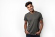 © ThomasLENNE - Half-Length (Waist-Up) portrait of young stylish smiling Honduran male model in grunge wear isolated on pure white background looking at camera