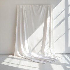 Aufkleber - Serene studio shot of white fabric draped against a white wall with light and shadows creating a soft visual