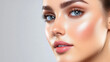 © Juiy - woman face with clear skin, showing natural glow and smooth complexion, highlighting her blue eyes and pink lips