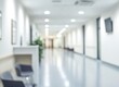 © El Media - Blurred Hospital Hallway Interior with Chairs and Waiting Area View