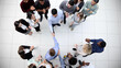 © Katsiaryna - top view. a group of employees standing in the lobby of the office