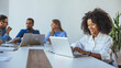© Dragana Gordic - Collaborative Team Meeting at Modern Office with Professional Atmosphere