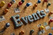 © Khawla - The word Events pinned to a cork notice board. Events may refer to news and current affairs, special occasions or circumstances that influence business planning
