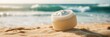 © misunderst00d - Moisturizing cream jar placed on sandy beach with ocean waves in background
