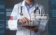 © JH45 - Doctor Approves Medical Application Using Tablet