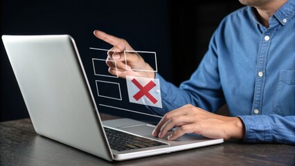 Rejection on Screen: A person points at the screen of a laptop displaying a rejected or declined choice, symbolizing failed attempt in modern digital world.