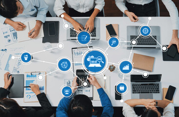Poster - A dynamic business team collaborates in a modern office setting, utilizing technology and data analysis tools for effective decision-making and strategic planning. Amity