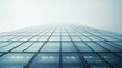 © VK Studio - A towering glass building disappears into the fog, creating a surreal blend of sharp lines and blurred horizon.