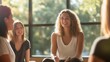 © fotofabrika - Group of women engaged in a lively discussion during a workshop at a bright, sunny location