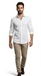 © IbragimovN - Confident man walking in white shirt and khaki pants isolated on white background