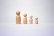 © Monthol - Happy family on wooden sculpture. Concept of people's lifestyle and love relationship.