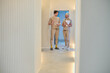 © Iuliia Versta/Stocksy - Two doctors discuss work